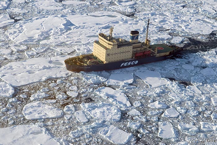 ArcticQ_20080902_165556_816_20.jpg - The Kapitan Klebnikov ploughs into a chunk of pack ice as we circle the ship in a helicopter.  Baffin Bay between Greenland and Ellesmere Island.