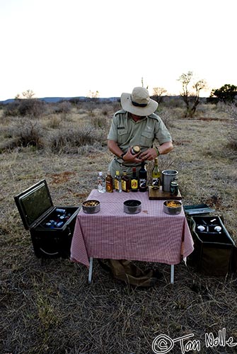 Africa_20081028_122636_097_20.jpg - Our ranger sets up for the sundown cocktails in Madikwe Reserve, South Africa.