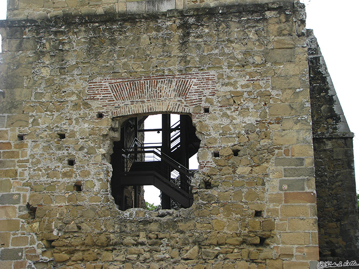 CostaRica_20100316_111624_034_S.jpg - A battered window shows the stairway in the old fort at Panama City, Panama.