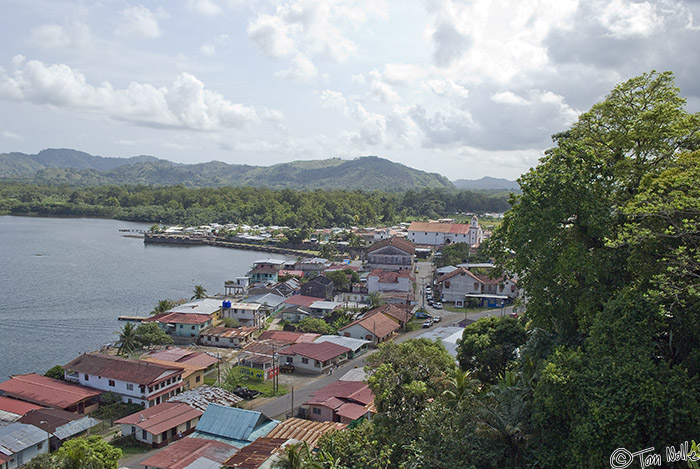 CostaRica_20100317_110256_686_20.jpg - This is the town today, as seen from a high overlook.  The church is visible just to the left of the tree in the distance.  Portobelo, Panama.