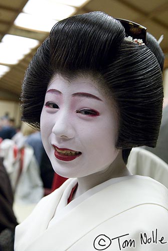 Japan_20080412_062812_245_20.jpg - Geisha often look pensive or sad, but once in a while they'll smile for the camera.  Kyoto Japan.