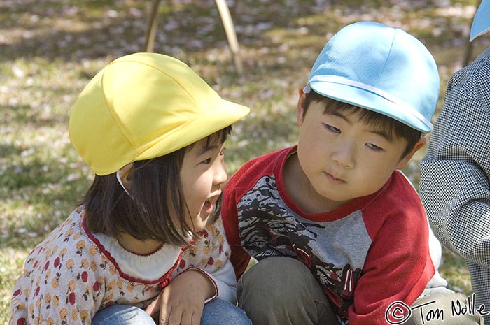 Japan_20080414_210840_809_2X.jpg - This Japanese boy seems to have the universal attitude of boys toward girls (which change as they reach their teen years, of course)!  Korakuen gardens Okayama Japan.