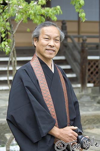 Japan_20080415_215808_151_2X.jpg - This 4th-generation Buddhist abbot presides over a mountainside temple in Uwajima Japan and is clearly a camera fan.