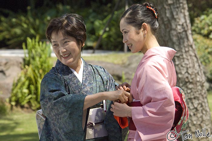 Japan_20080418_001950_220_2X.jpg - This may be a wedding party and the pretty lady a maid of honor, in which case the older one is likely her mom.  Kagoshima Japan.