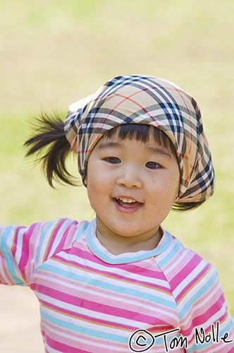 Japan_20080418_220916_413_2X.jpg - This child playing happily in the Peace Park is what we might all hope to represent the future.  Nagasaki Japan.