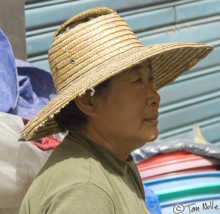 Japan_20080420_011802_627_2X.jpg - This woman is going to market in a hat that's rather the worse for wear.  Kyongju South Korea