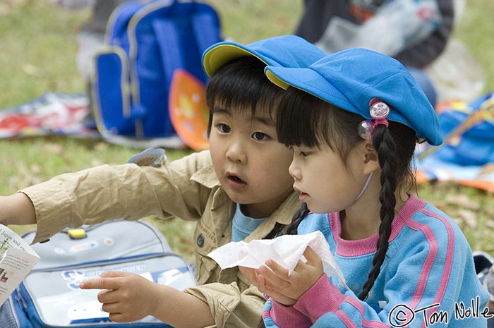 Japan_20080422_221602_205_2X.jpg - Two young children play in a class group in Shikoku-Mura, Takamatsu, Japan.