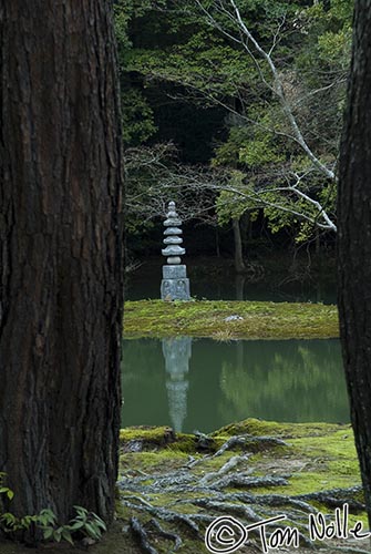 Japan_20080410_210220_041_20.jpg - A stone pagoda stands alone in a corner of the Rokuon-Ji temple garden in Kyoto Japan.