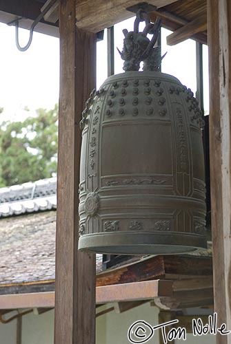 Japan_20080410_220034_056_20.jpg - A bronze bell is a typical adornment in Buddhist temples.  This one is in Rokuon-Ji Kyoto Japan.