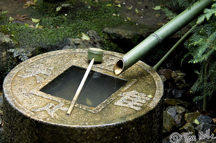 Japan_20080410_220546_317_2X.jpg - A perfect harmony of water, stone, and bamboo in the Rokuon-Ji temple garden Kyoto Japan.