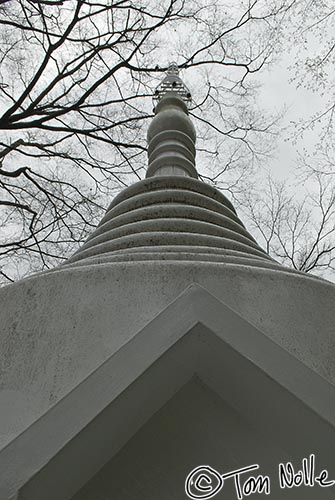 Japan_20080410_221728_072_20.jpg - An obelisk in Rokuon-Ji temple points up into a cloudy sky on a damp spring day in Kyoto Japan.