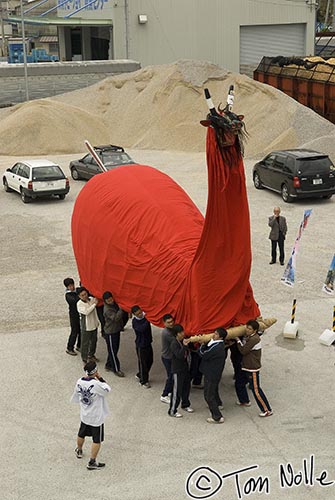 Japan_20080415_192010_674_20.jpg - This is quite a celebration of our arrival; the Ushioni Bull Demon is carried by a group of locals.  Uwajima Japan.