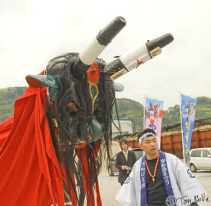 Japan_20080415_193700_723_20.jpg - The Uwajima Ushioni Festival demon and the head of the crew that man-handles him around.  Uwajima Japan.