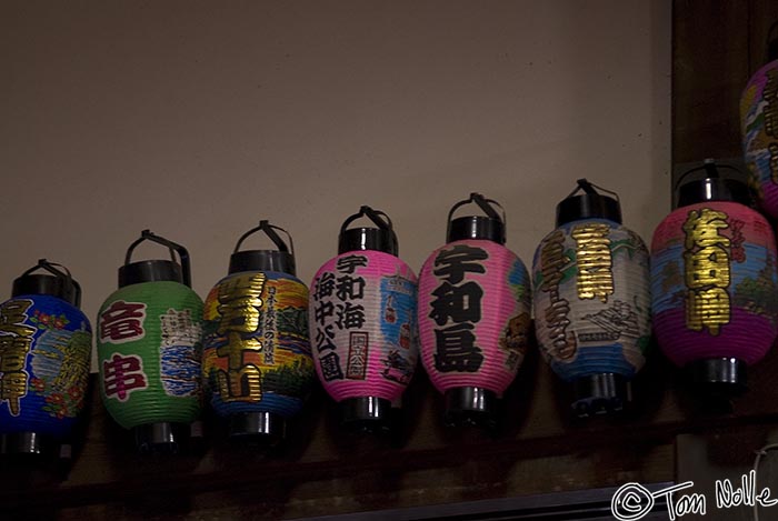 Japan_20080415_220812_764_20.jpg - A row of paper lanterns in a Buddhist temple almost look like soda cans.  Uwajima Japan.