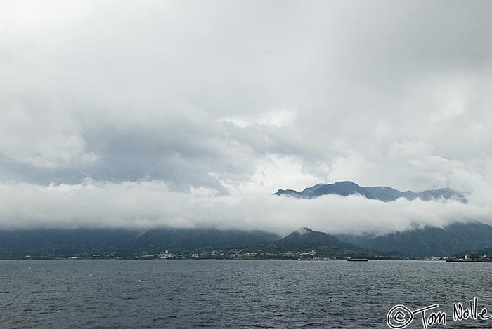 Japan_20080416_191654_820_20.jpg - Arriving on a rainy morning that has us concerned about conditions, we get our virst look at the World Heritage site of Yakushima Japan.  It's home to some incredible forests.