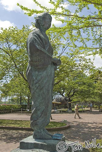 Japan_20080417_221834_090_20.jpg - A statue of a staff member whose role would have included sending the kamikazi pilots off.  Chiran Peace Museum Kagoshima Japan.