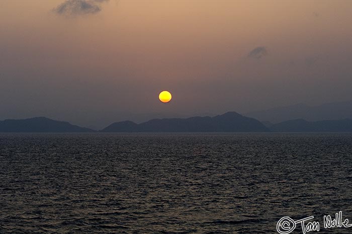 Japan_20080418_165656_243_2X.jpg - The sun finally sets as we cruise off Nagasaki Japan.