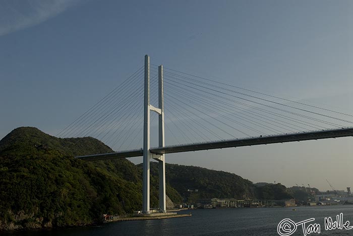 Japan_20080418_180938_118_20.jpg - The bridge is in sun while the hill is still shadowed as we enter the bay at Nagasaki Japan.