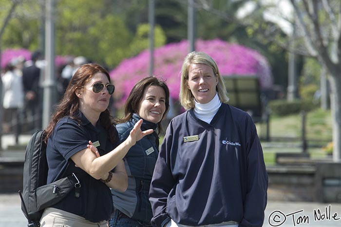 Japan_20080418_205338_398_2X.jpg - Could our Cruise West staff be plotting our route?  "Let's make them swim the fountain then walk through that thicket..."  Peace Park, Nagasaki Japan.