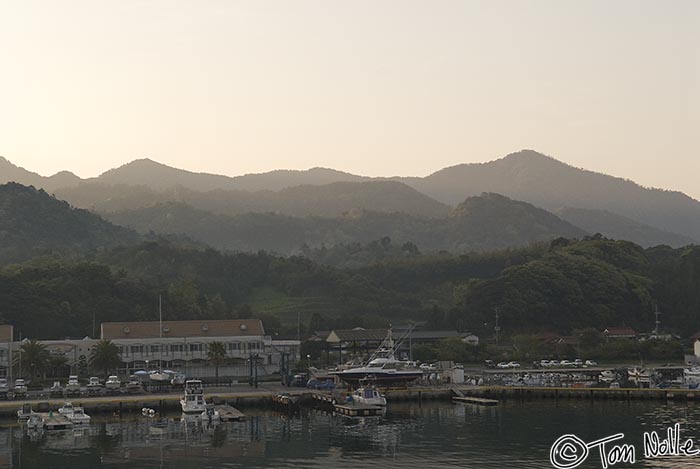 Japan_20080420_172316_356_20.jpg - A mist rises from the hills and trees that surround the harbor area as we arrive in Hagi, Japan