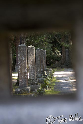 Japan_20080420_210054_388_20.jpg - Stone columns in the Tokoji gardens, viewed through a stone lantern.  Hagi, Japan