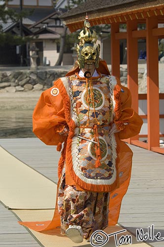 Japan_20080421_203544_895_2X.jpg - A Shinto dance seems stylized to represent combat, and this is the hero.  Itsukushima shrine, Miyajima, Japan.