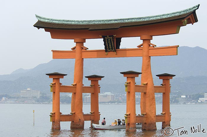 Japan_20080421_213622_966_2X.jpg - A boat takes some of the faithful through the famous floating tori in Miyajima, Japan.