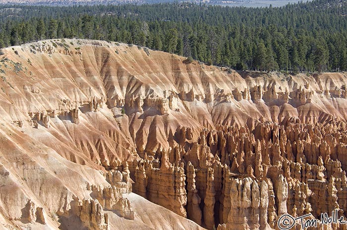 Canyonlands_20080528_112454_541_2X.jpg - The western edge of the Terra Cotta Soldiers formation ends in a sweep of colorful sand.  Bryce Canyon Utah.