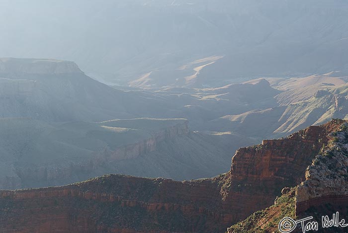 Canyonlands_20080531_090314_414_20.jpg - Mist hangs in the canyon, obscuring the distant portions but letting closer features stand out sharply.  Grand Canyon North Rim, Arizona.